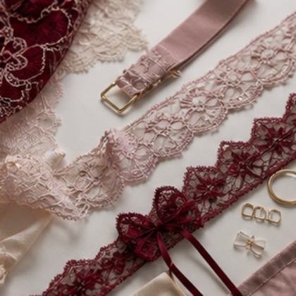 Lace trim straps bows and hardware close-up for lingerie development